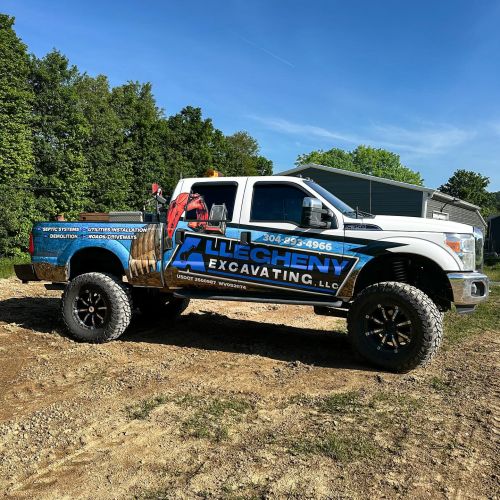 Excavating Half Wrap on a Lifted Truck